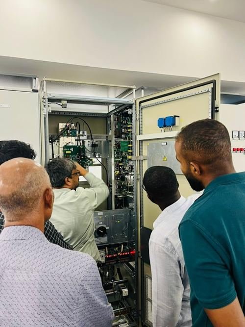 WARAKH team inspecting control panel